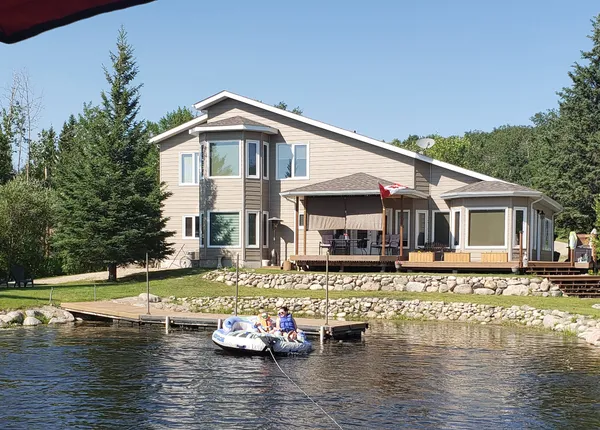 Summer on lake with dock and tube